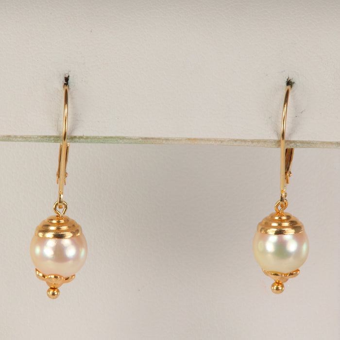 yellow gold pearl dangle earrings