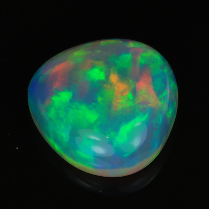 pear shape cabochon rainbow opal gem