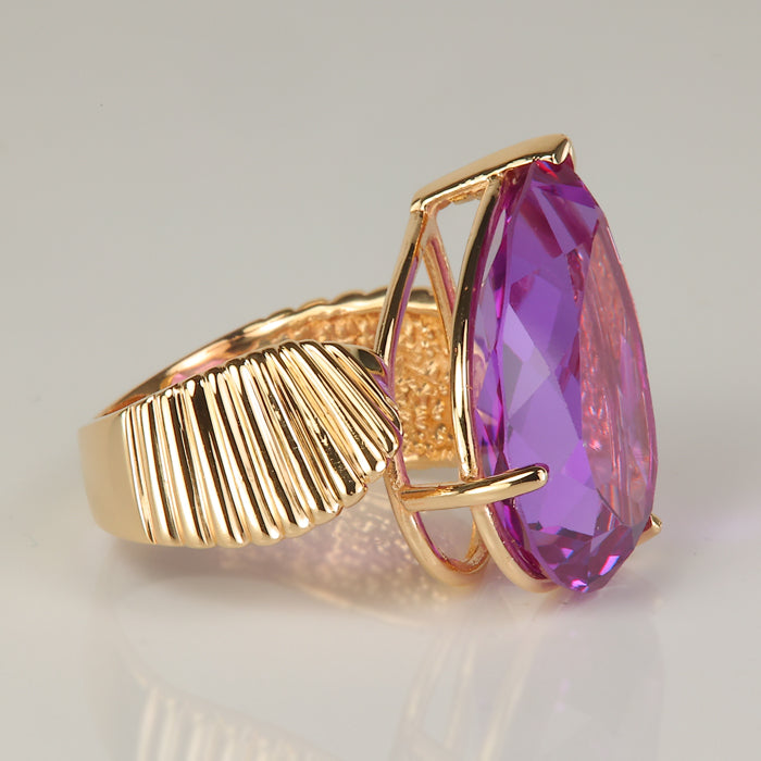 synthetic purple sapphire ring in yellow gold