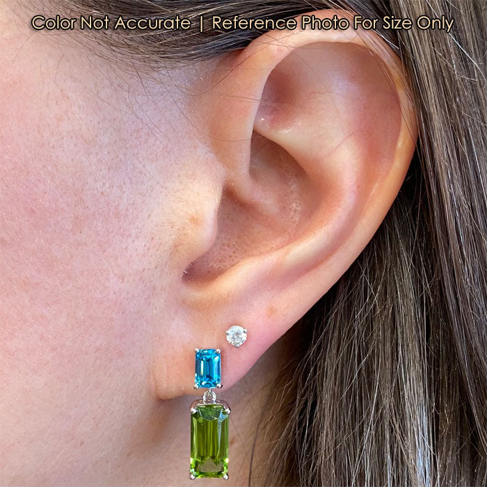 peridot gemstone and blue zircon accented earrings in white gold