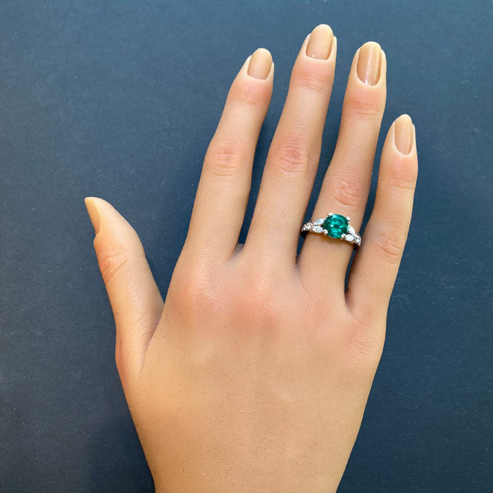 emerald and diamond ring in platinum