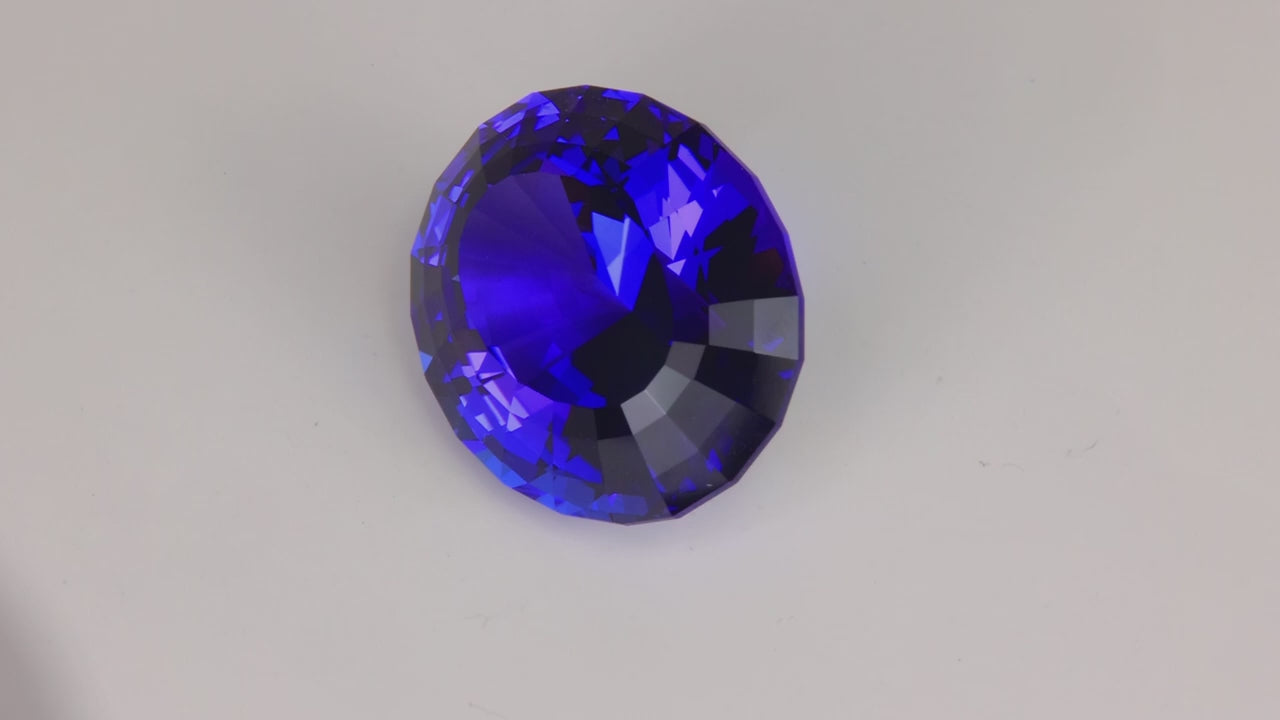 Step Oval Cut Tanzanite 24.46 Carats 1000/1000