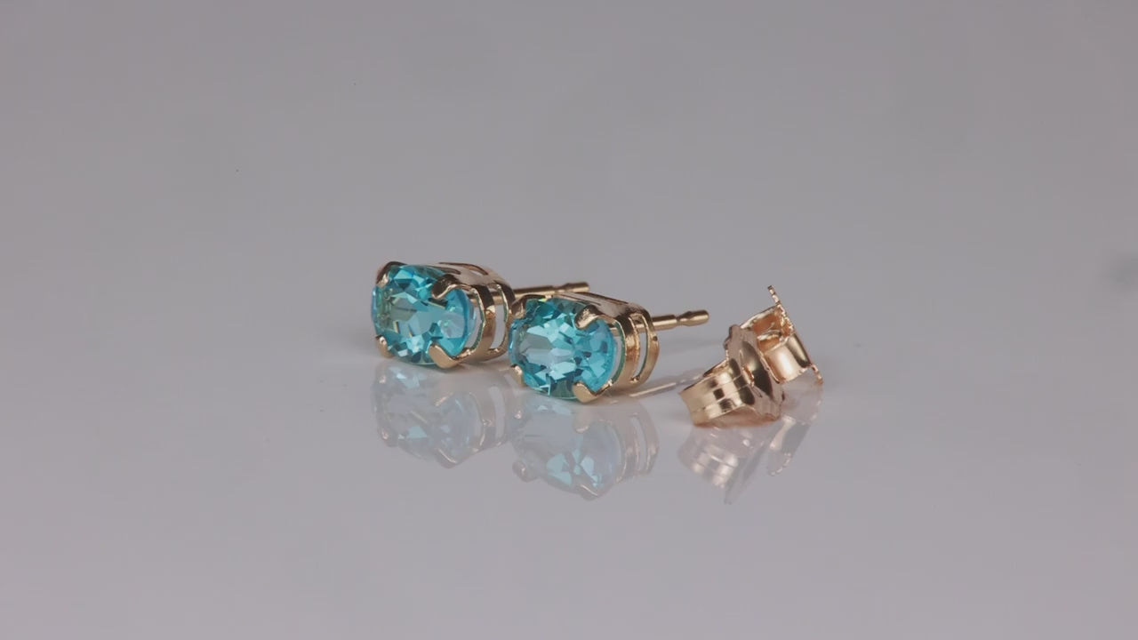14K Yellow Gold Oval Cut Blue Topaz Stud Earrings