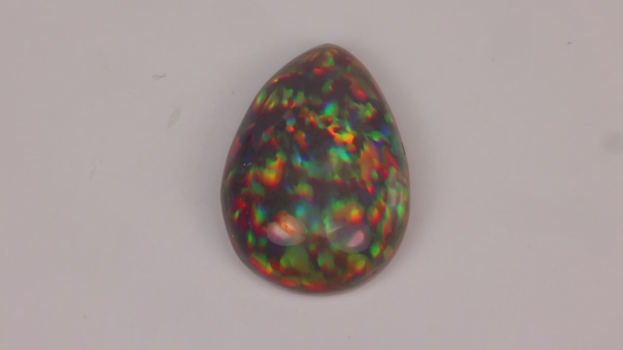 Pear Shape Cabochon Cut Black Opal 8.64 Carats