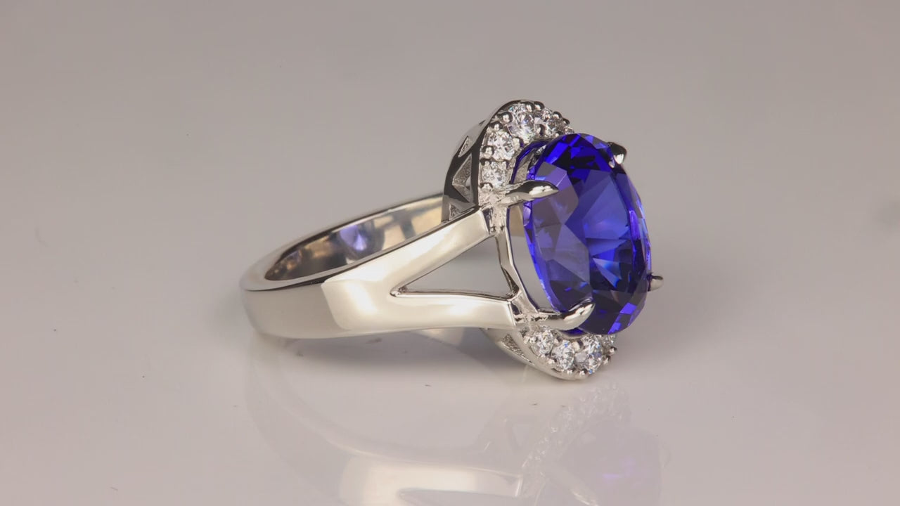 Platinum Oval Cut Tanzanite and Diamond Ring 6.47 Carats
