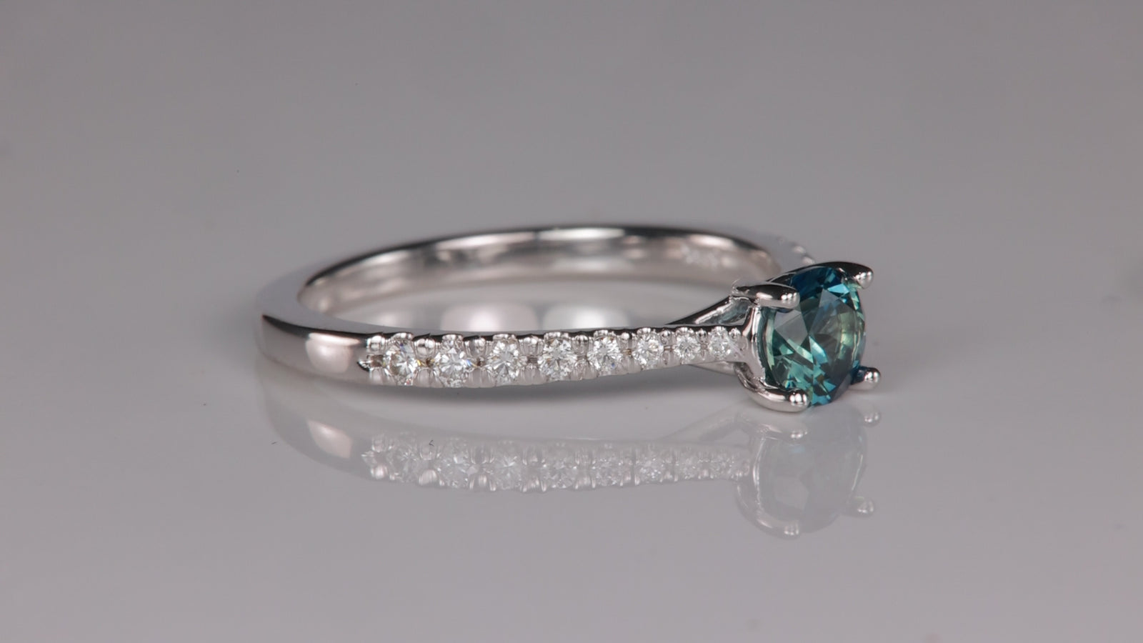 Bluish Green Round Brilliant Sapphire Engagement ring