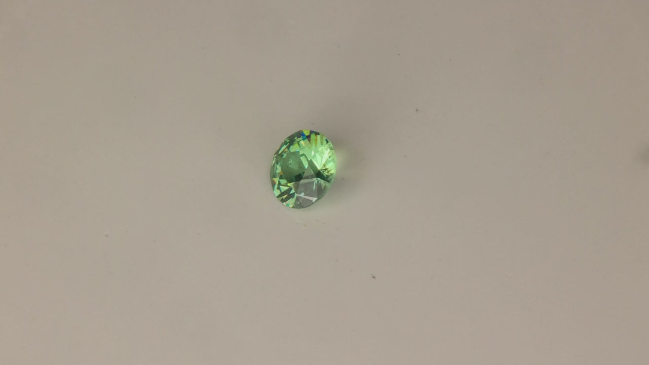Round Brilliant Demantoid Garnet .84cts