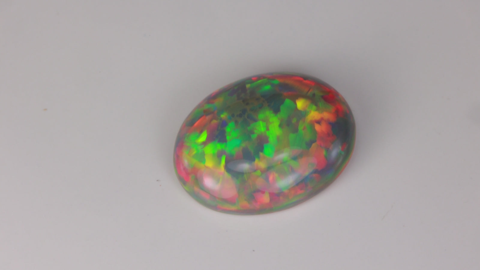 Oval Cabochon Cut Black Opal From Ethiopia 13.69 Carats