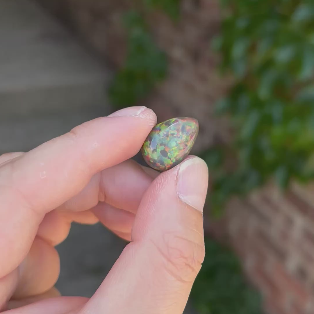 Pear Shape Cabochon Cut Black Opal 8.64 Carats
