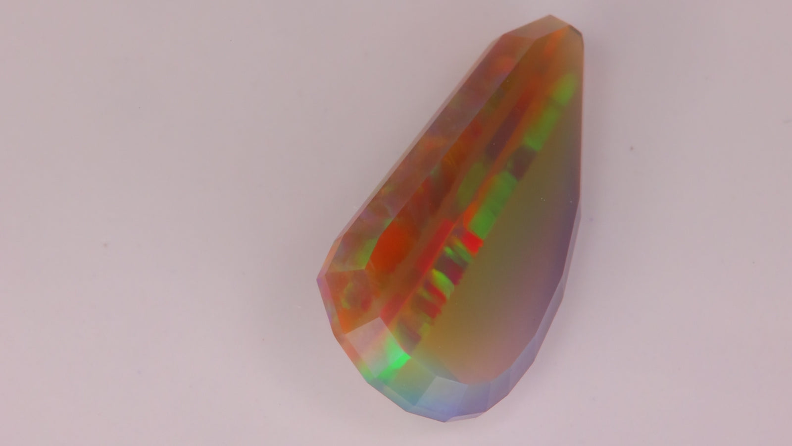 Freeform Faceted Semi Black Opal 6.25 Carats