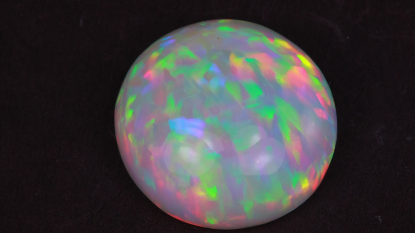 Round Cabochon Hydrophane Opal 22.74 Carats