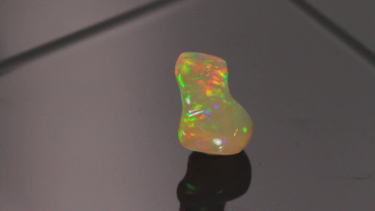 Freeform Carved Welo Opal 19.30 Carats