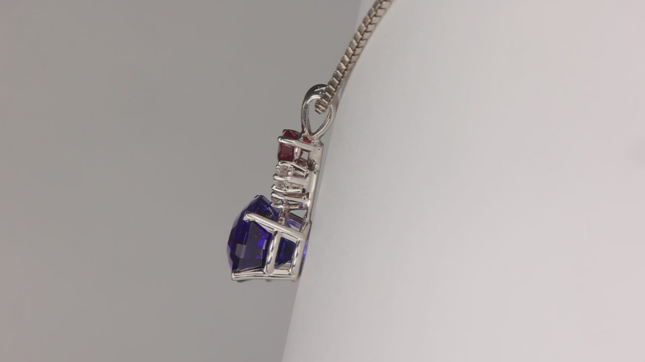 14K White Gold 9.91ct Stepped Oval Tanzanite and Ruby Pendant With Diamonds