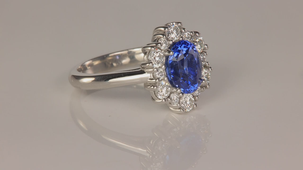 Platinum Oval Cut Sapphire and Diamond Halo Ring 2.74 Carats