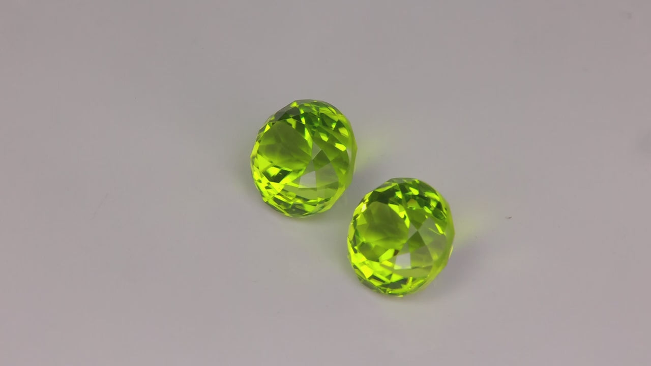 (ON HOLD) Pair of Round Portuguese Cut Peridot 7.10 Carats