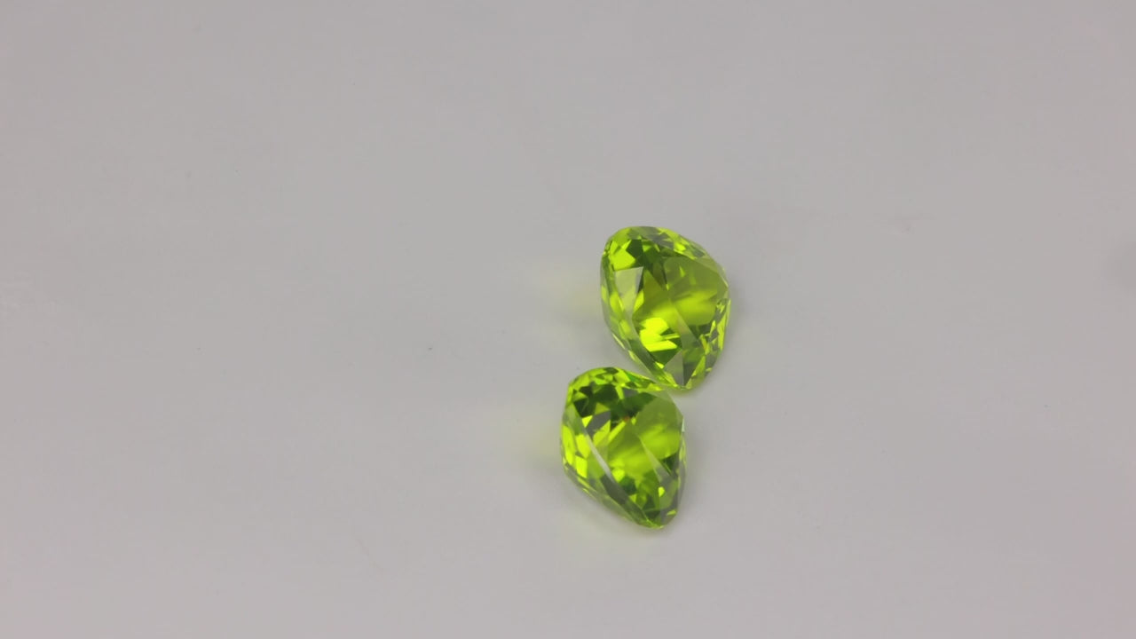 Pair of Trilliant Cut Peridots 7.22 Carats