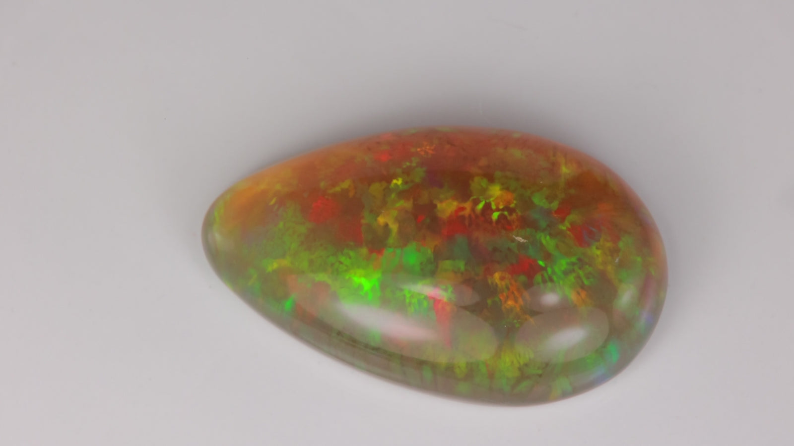 Semi Black Pear Shape Opal 32.50 Carats