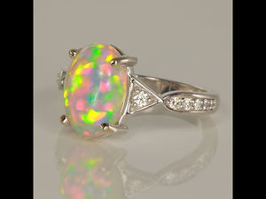 Ethiopian Opal Oval Ring with Diamonds in 14 white gold