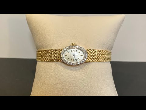 14K Yellow Gold and Diamond Movado Watch .25 Carat