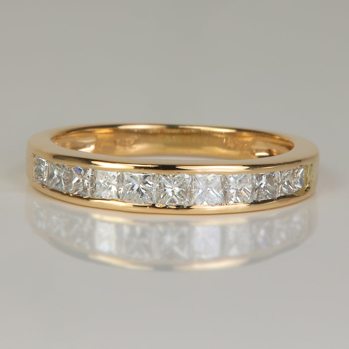 yellow gold channel set princess cut diamond ring