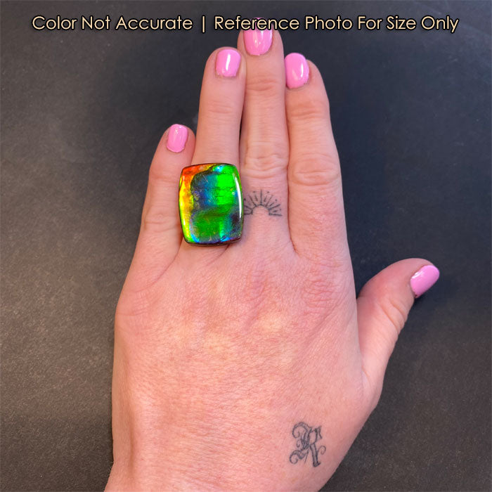 antique cushion ammolite on hand size