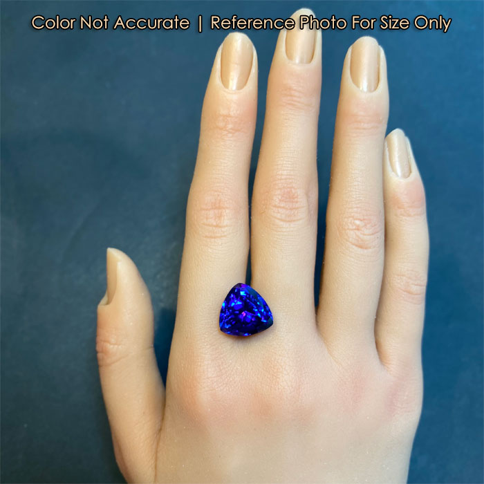 tanzanite gem trilliant cut rare size on a hand