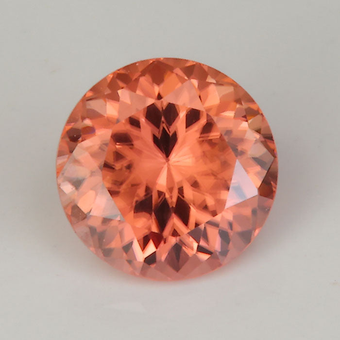 round brilliant zircon gemstone peach color