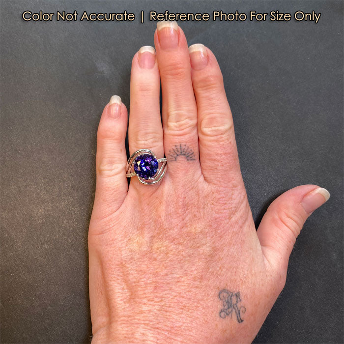 tanzanite and diamond ring on hand