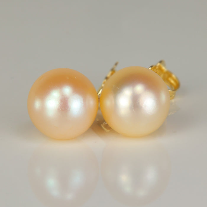 yellow gold pearl stud earrings