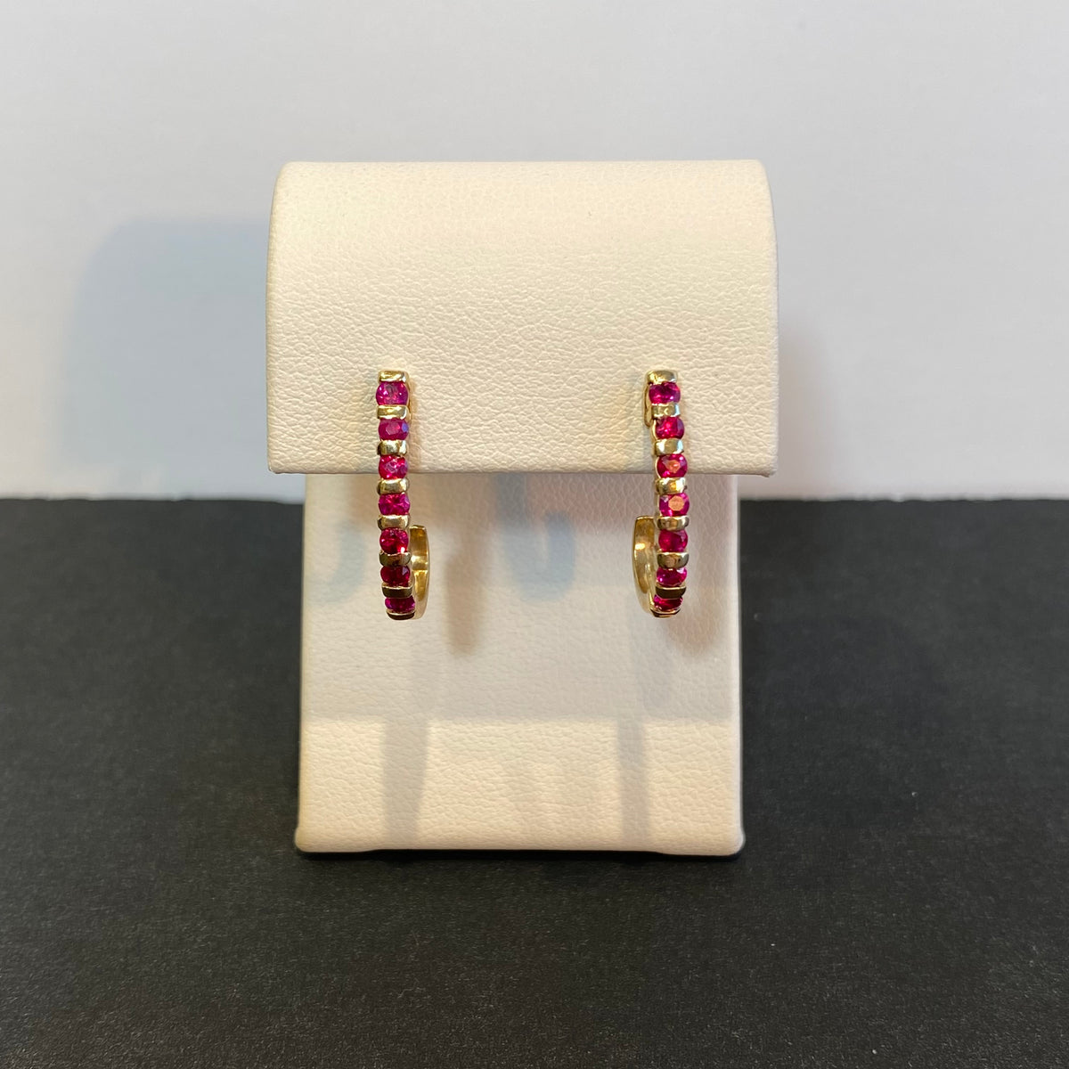 yellow gold and ruby earrings