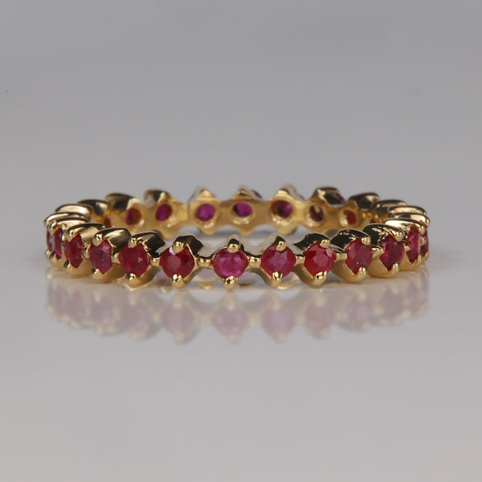 yellow gold ruby eternity ring