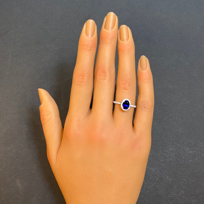 sapphire and diamond halo ring in white gold