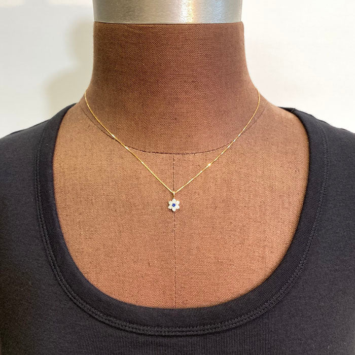 sapphire and diamond pendant yellow gold