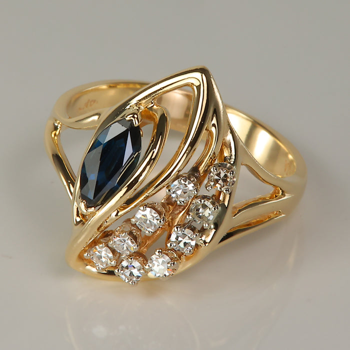 yellow gold marquise sapphire and diamond ring