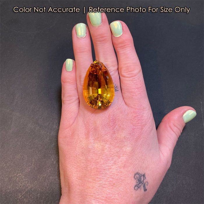 pear shape golden yellow scapolite gem