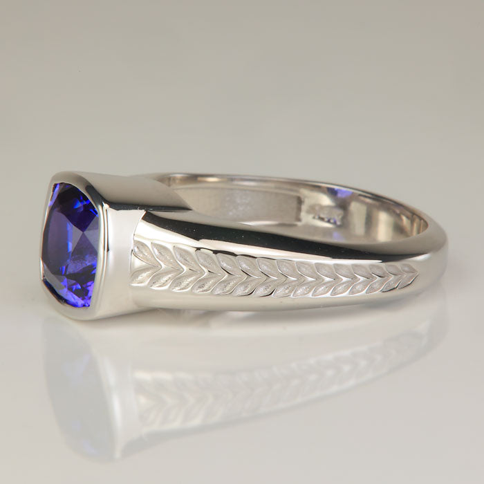 millwork on white gold tanzanite ring