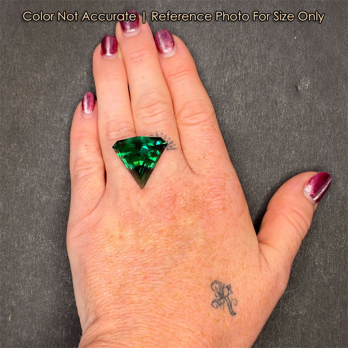 green fluorite gem on hand size 