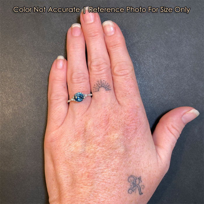 mixed round cut montana sapphire ring with diamonds