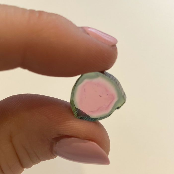 pink and greyish green tourmaline gem