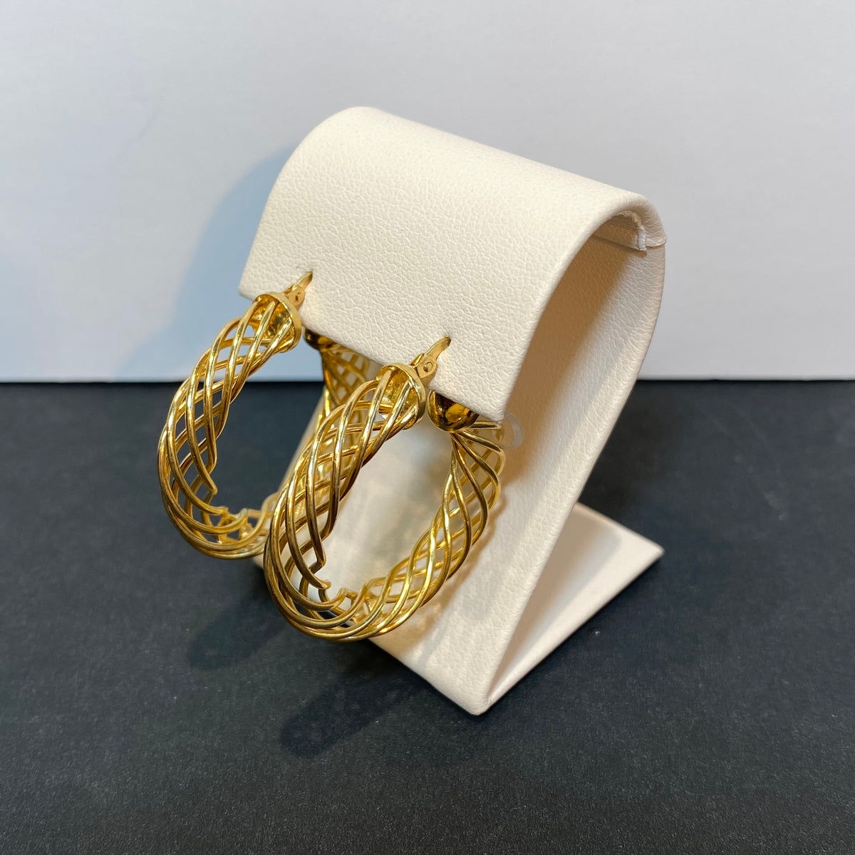 yellow gold spiral hoop earrings