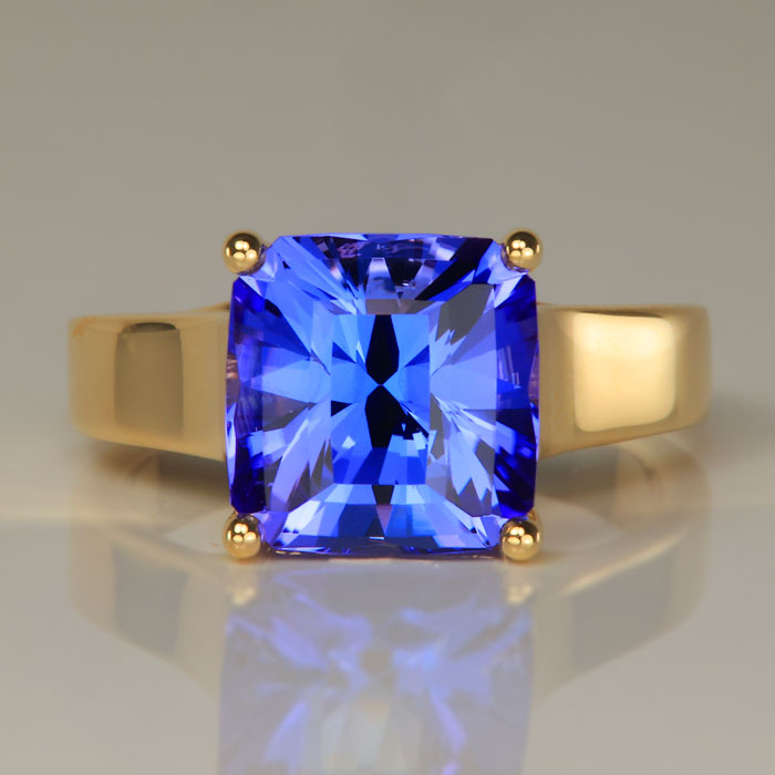 yellow gold and square brilliant tanzanite gem ring