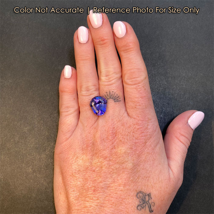 tanzanite gemstone on hand step shield cut 