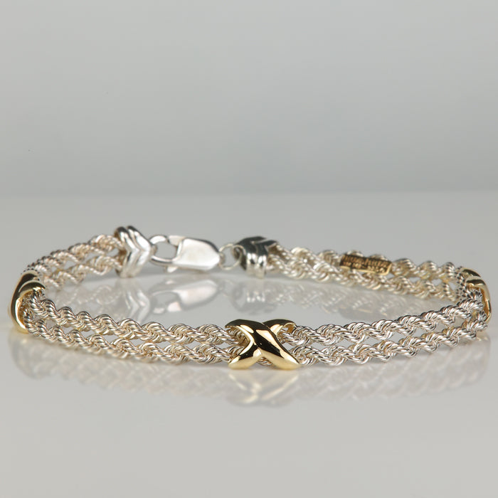 sterling and yellow gold rope link bracelet with x design
