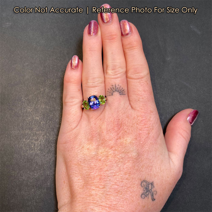 size of white gold tanzanite ring with peridot