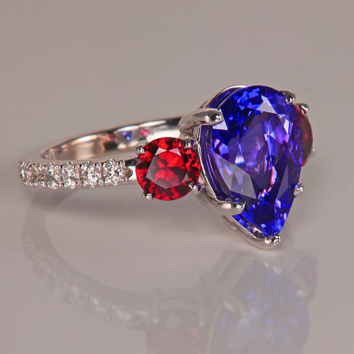 pear tanzanite and round pyrope garnet ring