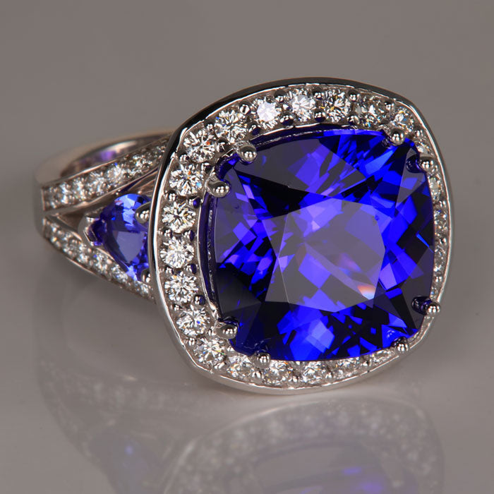 square cushion tanzanite ring with diamonds in white gold