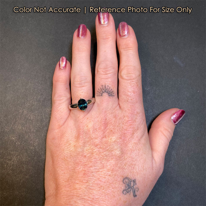 size of blue green sapphire ring on hand