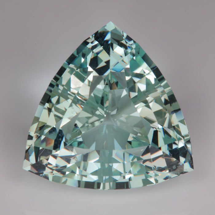 blue green topaz gemstone trilliant cut beautiful