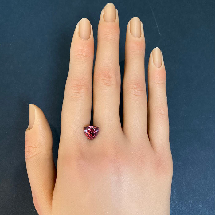 trilliant zircon gem peachy red