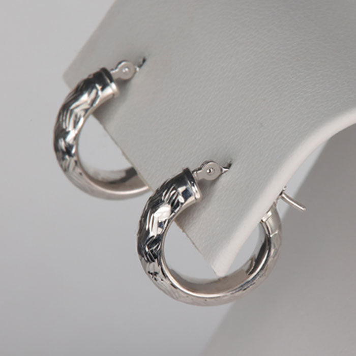 diamond cut white gold hoop earrings